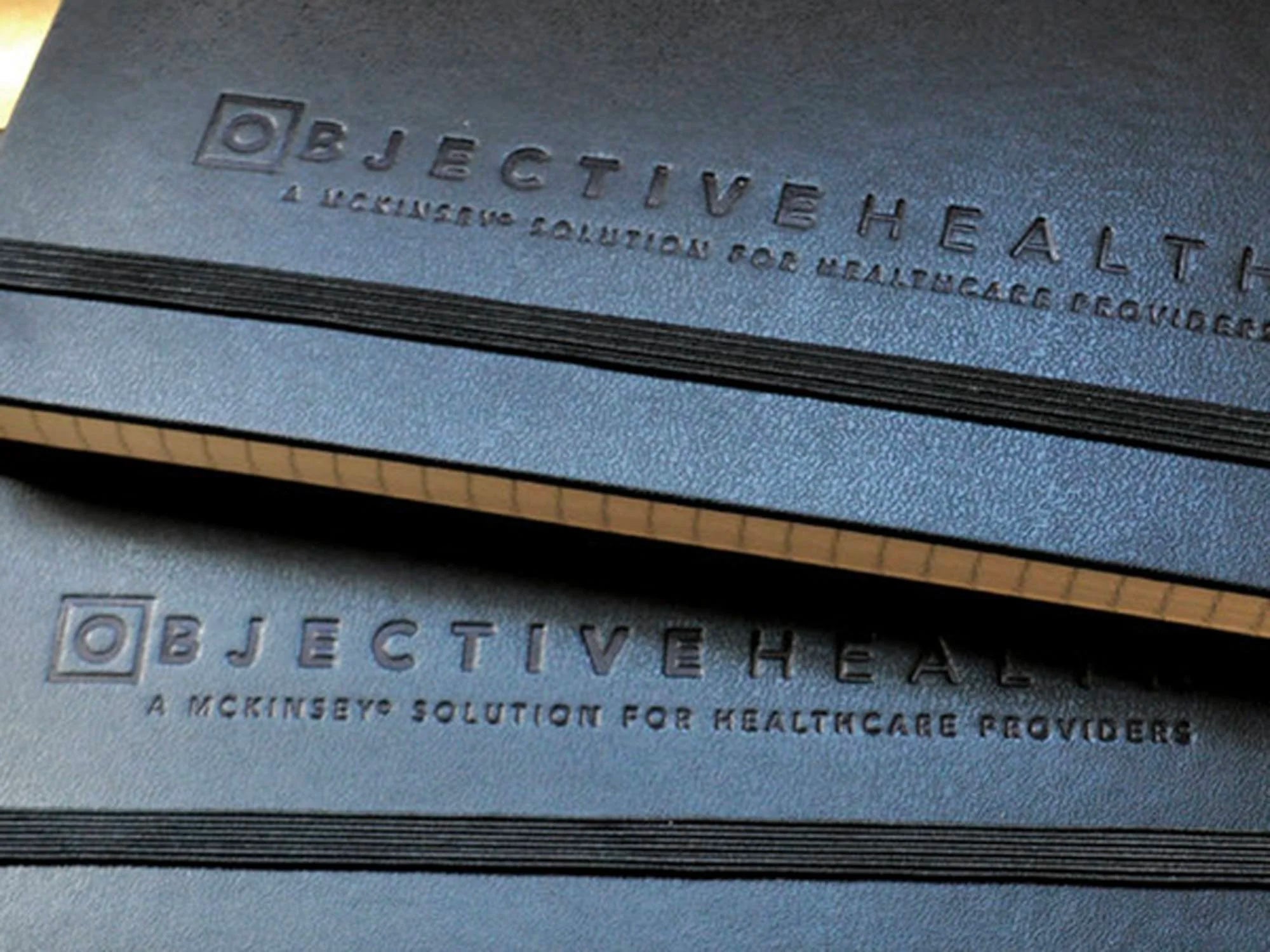 Blind Embossed Vertical Logo